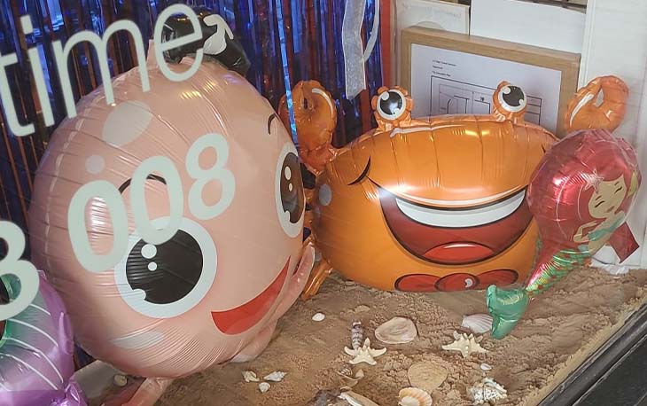 Balloon crab and whale celebrating Ocean Week